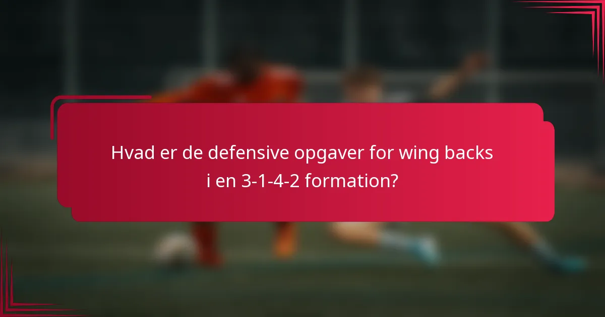Hvad er de defensive opgaver for wing backs i en 3-1-4-2 formation?